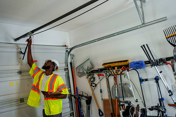 Professional Garage Door Maintenance technician working in Scanlon, MN